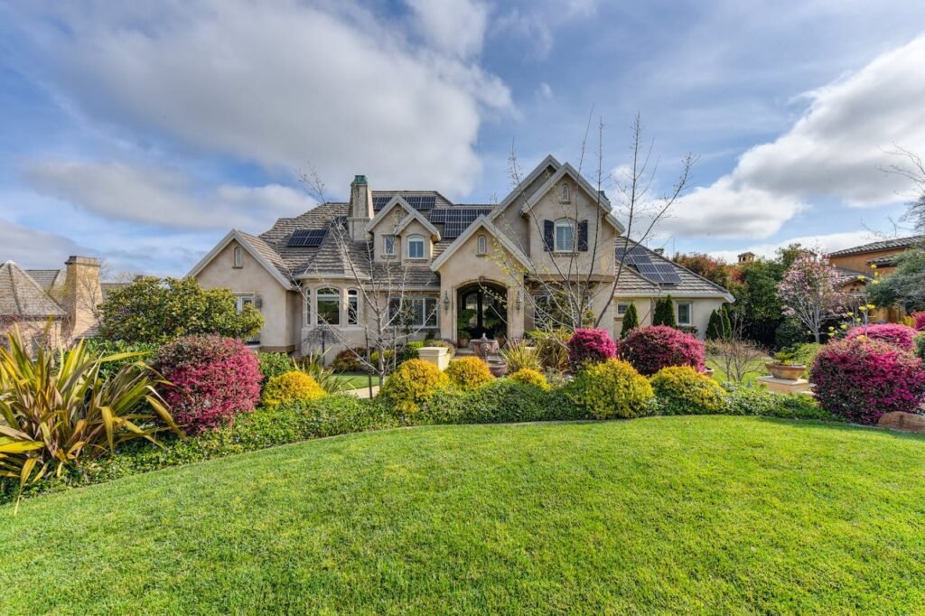 Image of a renovated home showcasing a modern interior design, featuring fresh paint, new flooring, and updated fixtures, symbolizing successful property flipping.