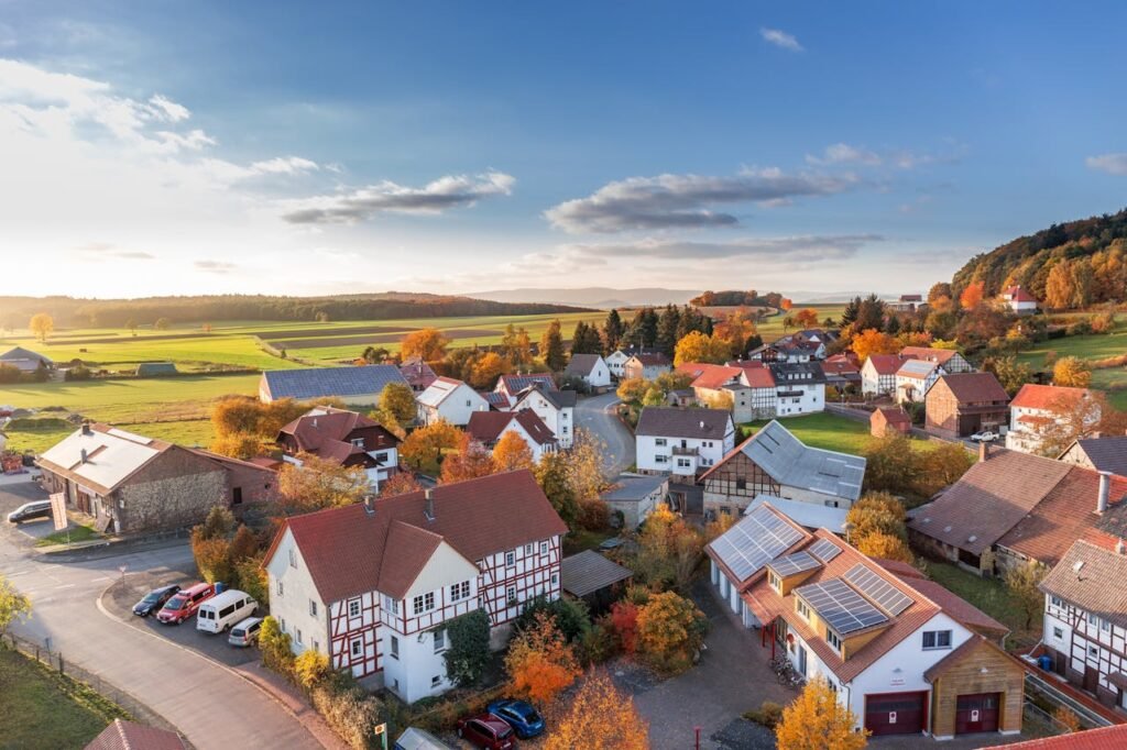 Real estate professionals reviewing property contracts, facilitating a wholesale deal between a seller and a buyer for quick closing.